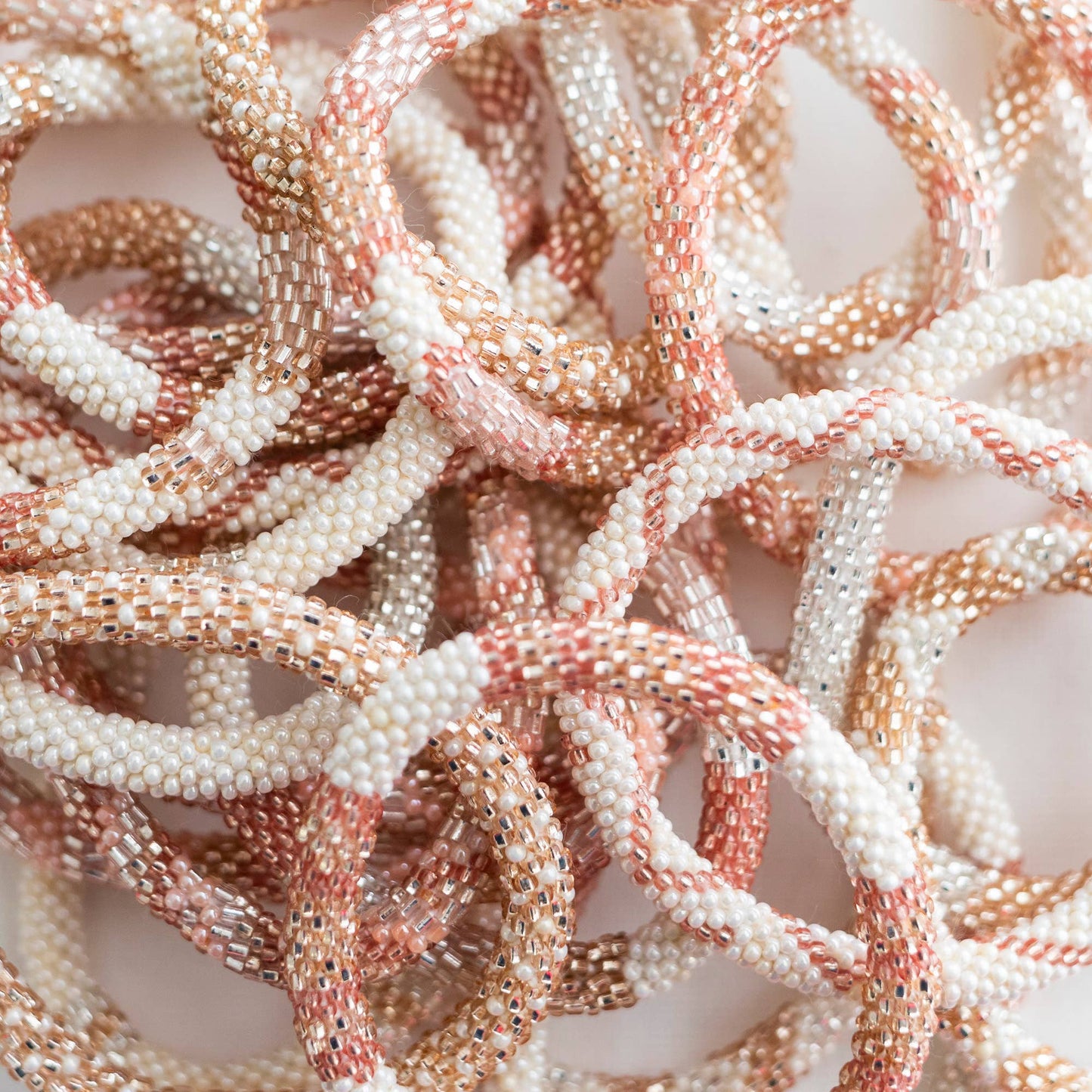 Aid Through Trade - Roll-On® Bracelets Rosé All Day - Set of 12