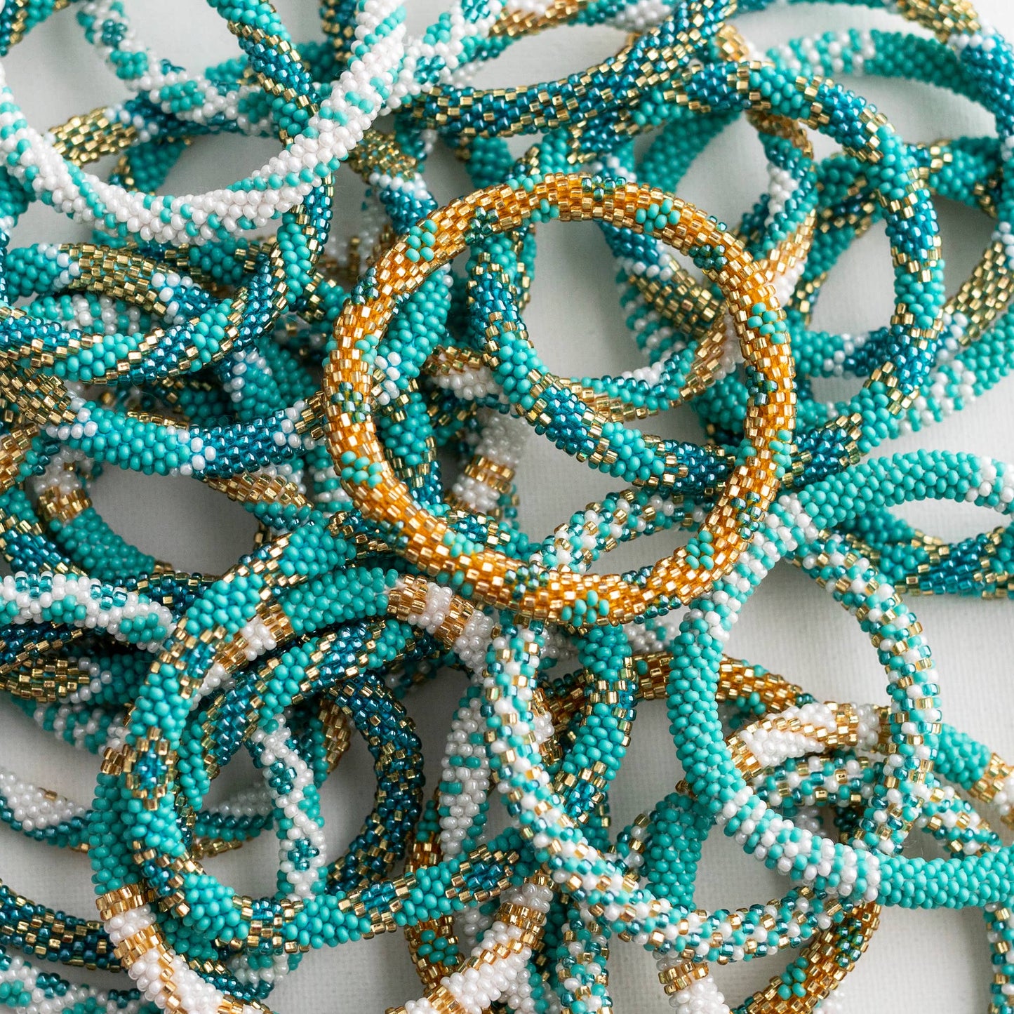 Aid Through Trade - 💎 Roll-On® Jewelry -  Aquamarine - Set of 12 Bracelets 